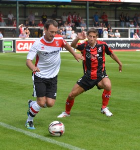 Williams featuring for Woking vs Bournemouth last Saturday