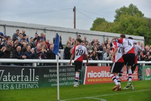 Josh Payne celebrates his goal in Woking's 2-0 win vs Nuneaton