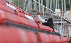 Garry Hill watches on during pre-season.