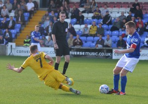 Lee Sawyer slides in against Macclesfield last season.